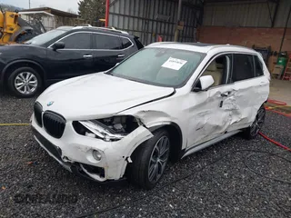 2017 BMW X1 xDrive28i with VIN WBXHT3C36H5F74818, listed as a IAAI auction lot 41853836 with 71,735 mi miles and . Bid and sale history available at DreamBid. Image 2.