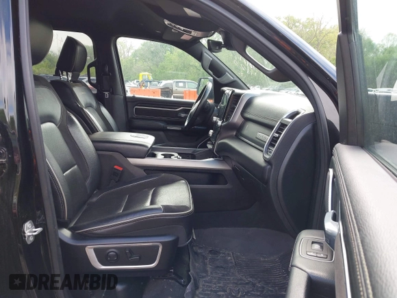 2023 Ram 1500 Laramie with VIN 1C6SRFJTXPN541328, listed as a IAAI auction lot 42121615 with 61,939 mi miles and . Bid and sale history available at DreamBid. Image 5.