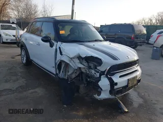 2015 MINI Cooper Countryman S with VIN WMWZC5C50FWP42324, listed as a IAAI auction lot 41795698 with 95,746 mi miles. Bid and sale history available at carsss.com. Image 1.