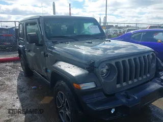 2020 Jeep Wrangler Unlimited Sport Altitude with VIN 1C4HJXDG2LW335228, listed as a IAAI auction lot 41711295 with 43,451 mi miles and . Bid and sale history available at DreamBid. Image 1.