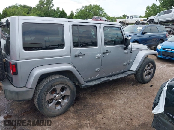 2016 Jeep Wrangler Unlimited Sahara z VIN 1C4BJWEGXGL280016, wystawiony jako IAAI lot #42620102 z przebiegiem 128 232 mil mil oraz . Historia ofert i sprzedaży dostępna na DreamBid. Obrazek 14.