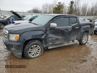 2015 GMC Canyon 4WD SLT with VIN 1GTG6CE36F1130143, listed as a Copart auction lot 47057675 with 127,112 mi miles and Clean title. Bid and sale history available at DreamBid. Image 1.
