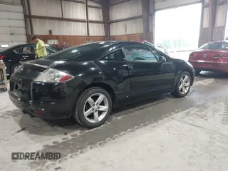 2009 Mitsubishi Eclipse GS z VIN 4A3AK24FX9E013800, wystawiony jako IAAI lot #42525551 z przebiegiem 108 766 mil mil oraz . Historia ofert i sprzedaży dostępna na DreamBid. Obrazek 4.