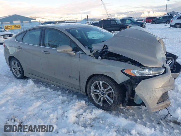 2016 Ford Fusion SE Hybrid with VIN 3FA6P0LU8GR127311, listed as a IAAI auction lot 41242945 with 1 mi miles. Bid and sale history available at carsss.com. Image 1.