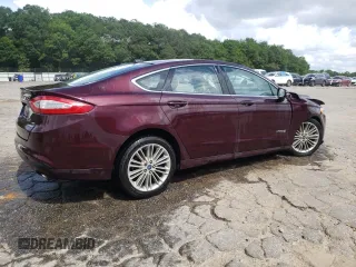 2013 Ford Fusion SE Hybrid z VIN 3FA6P0LU7DR197801, wystawiony jako Copart lot #60468095 z przebiegiem 169 215 mil mil oraz Szkoda całkowita • Salvage title. Historia ofert i sprzedaży dostępna na DreamBid. Obrazek 3.