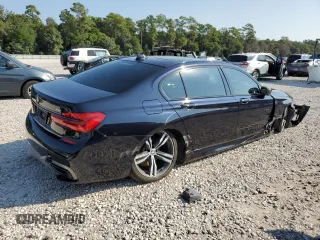 2019 BMW 7 Series 740i with VIN WBA7E2C50KB216499, listed as a Copart auction lot 68828673 with 94,549 mi miles. Bid and sale history available at carsss.com. Image 3.