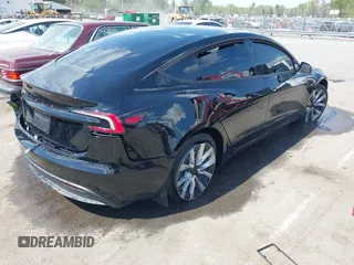 2025 Tesla Model 3 Long Range z VIN 5YJ3E1EA2SF918505, wystawiony jako IAAI lot #41968148 z przebiegiem 2490 mil mil oraz . Historia ofert i sprzedaży dostępna na DreamBid. Obrazek 4.