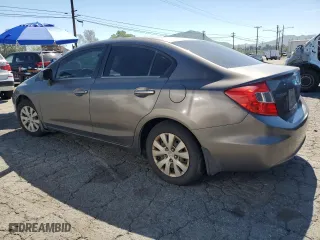 2012 Honda Civic Sdn LX with VIN 19XFB2F50CE304007, listed as a Copart auction lot 49534745 with 329,732 mi miles and Clean Title. Bid and sale history available at carsss.com. Image 2.