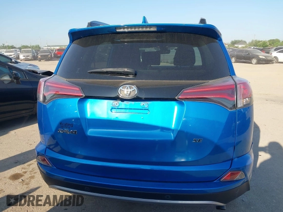 2018 Toyota RAV4 SE with VIN JTMNFREV3JJ156865, listed as a IAAI auction lot 41986697 with 124,979 mi miles and . Bid and sale history available at DreamBid. Image 17.
