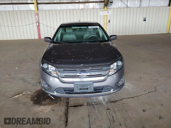 2010 Ford Fusion SE with VIN 3FAHP0HA2AR320858, listed as a Copart auction lot 52054045 with 151,943 mi miles and Salvage Title. Bid and sale history available at DreamBid. Image 5.