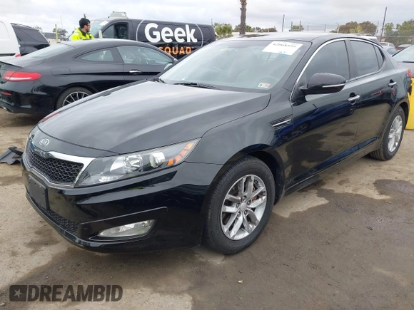 2012 Kia Optima LX with VIN KNAGM4A72C5291451, listed as a IAAI auction lot 42068559 with 121,548 mi miles and . Bid and sale history available at carsss.com. Image 2.