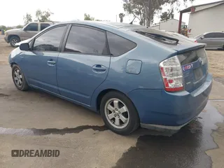 2007 Toyota Prius with VIN JTDKB20U477685445, listed as a IAAI auction lot 42020786 with 243,679 mi miles. Bid and sale history available at carsss.com. Image 3.