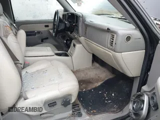 2002 Chevrolet Suburban LS z VIN 3GNEC16Z72G304778, wystawiony jako IAAI lot #42165459 z przebiegiem 257 422 mil mil oraz . Historia ofert i sprzedaży dostępna na DreamBid. Obrazek 5.