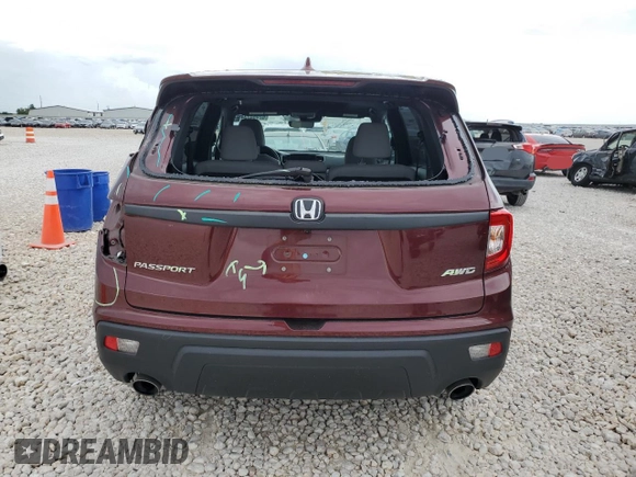2021 Honda Passport EX-L with VIN 5FNYF8H52MB001660, listed as a Copart auction lot 62454734 with 51,143 mi miles and Salvage Title. Bid and sale history available at carsss.com. Image 6.