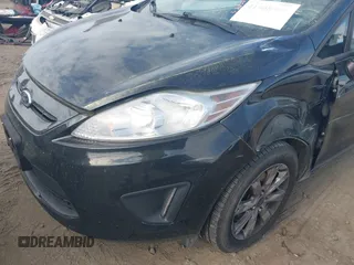 2013 Ford Fiesta SE with VIN 3FADP4EJ7DM140755, listed as a IAAI auction lot 41908366 with 68,744 mi miles. Bid and sale history available at carsss.com. Image 6.