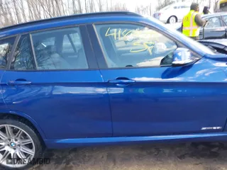 2015 BMW X1 sDrive28i with VIN WBAVM1C58FV314947, listed as a IAAI auction lot 41874472 with 128,271 mi miles. Bid and sale history available at carsss.com. Image 13.