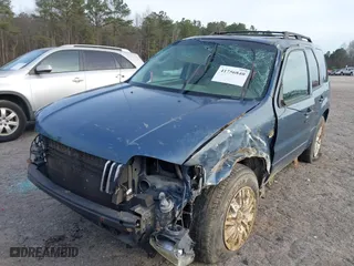 2006 Mercury Mariner Luxury with VIN 4M2CU57186DJ07953, listed as a IAAI auction lot 41756840 with 163,988 mi miles. Bid and sale history available at carsss.com. Image 6.