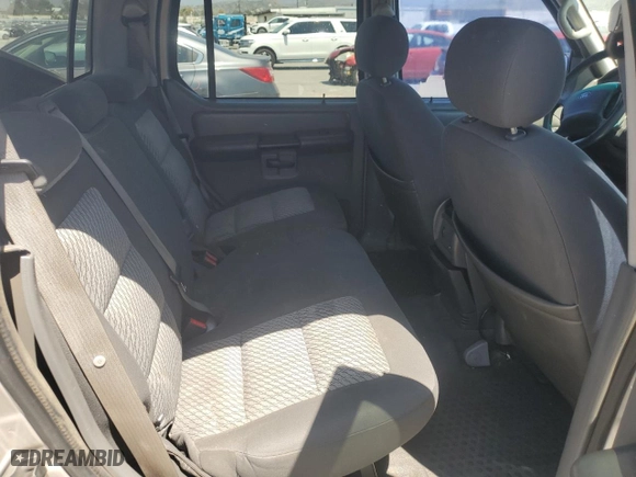 2004 Ford Explorer Sport Trac XLS with VIN 1FMZU67K34UB93390, listed as a Copart auction lot 53912075 with 220,520 mi miles and Salvage Title. Bid and sale history available at carsss.com. Image 10.