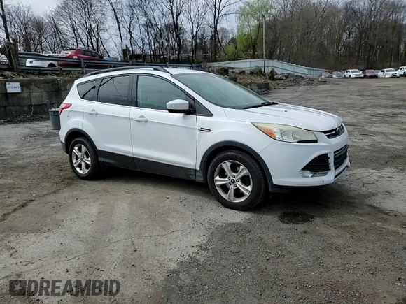 2014 Ford Escape SE with VIN 1FMCU0GX4EUB83323, listed as a Copart auction lot 51775125 with 129,437 mi miles and Salvage Title. Bid and sale history available at DreamBid. Image 12.