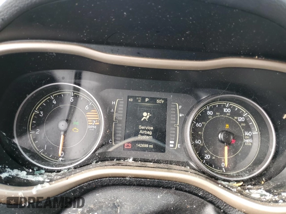 2016 Jeep Cherokee Sport with VIN 1C4PJLAB0GW189379, listed as a Copart auction lot 52239555 with 142,699 mi miles and Salvage title. Bid and sale history available at DreamBid. Image 9.