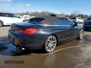 2012 BMW 6 Series 650i z VIN WBALZ3C57CDL73218, wystawiony jako Copart lot #49639975 z przebiegiem 54 408 mil mil oraz Szkoda całkowita • Salvage title. Historia ofert i sprzedaży dostępna na DreamBid. Obrazek 3.
