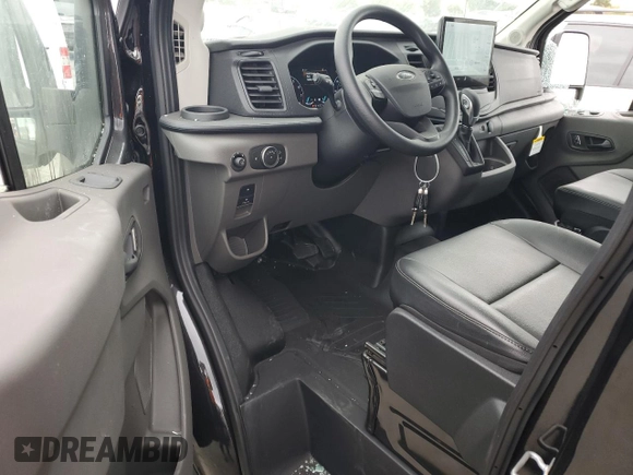 2024 Ford Transit Cargo with VIN 1FTBR1C86RKA98779, listed as a Copart auction lot 70473944 with 35 mi miles and Salvage Title. Bid and sale history available at DreamBid. Image 8.
