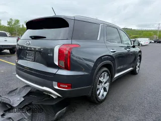 2020 Hyundai Palisade SEL z VIN KM8R4DHE6LU061204, wystawiony jako Copart lot #57970425 z przebiegiem 152 321 mil mil oraz Czysty tytuł • Clean title. Historia ofert i sprzedaży dostępna na DreamBid. Obrazek 4.