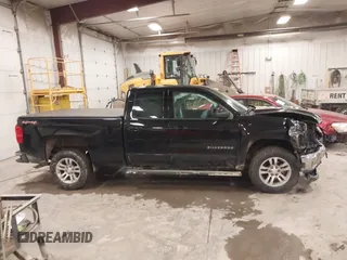 2016 Chevrolet Silverado 1500 LT with VIN 1GCVKREC5GZ176474, listed as a IAAI auction lot 41983780 with 118,587 mi miles and . Bid and sale history available at DreamBid. Image 13.