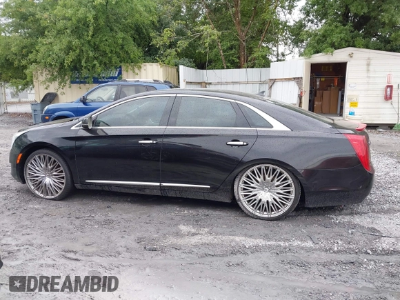2014 Cadillac XTS Luxury z VIN 2G61N5S38E9292684, wystawiony jako IAAI lot #41842596 z przebiegiem 130 318 mil mil oraz . Historia ofert i sprzedaży dostępna na DreamBid. Obrazek 14.