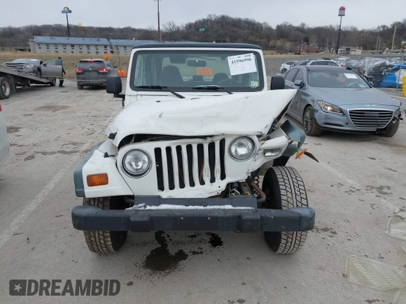 1998 Jeep Wrangler SE with VIN 1J4FY29P9WP793260, listed as a IAAI auction lot 41596990 with 90,766 mi miles. Bid and sale history available at carsss.com. Image 12.