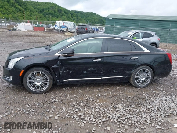 2014 Cadillac XTS Luxury with VIN 2G61M5S32E9231544, listed as a IAAI auction lot 42340088 with 74,518 mi miles and . Bid and sale history available at DreamBid. Image 14.