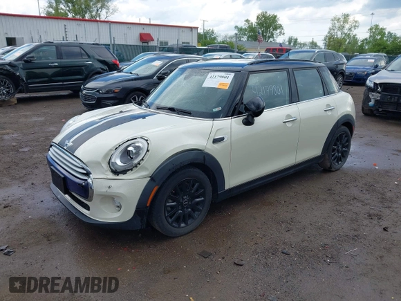 2015 MINI Hardtop 4 Door with VIN WMWXS5C52FT831291, listed as a IAAI auction lot 42179801 with 63,261 mi miles and . Bid and sale history available at DreamBid. Image 18.