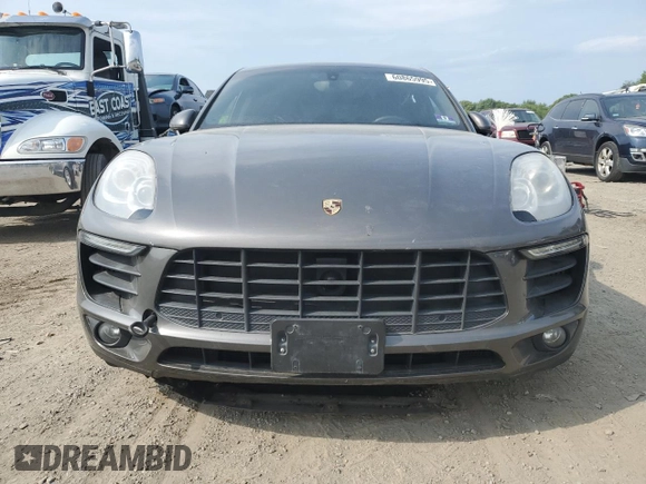 2015 Porsche Macan S with VIN WP1AB2A50FLB69249, listed as a Copart auction lot 60865995 with 128,659 mi miles and Salvage title. Bid and sale history available at DreamBid. Image 5.