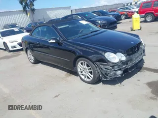2009 Mercedes-Benz CLK-Class 3.5L with VIN WDBTK56F29T107402, listed as a IAAI auction lot 41934705 with 235,246 mi miles. Bid and sale history available at carsss.com. Image 1.