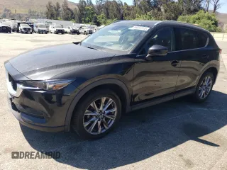 2020 Mazda CX-5 Grand Touring with VIN JM3KFBDM9L0869045, listed as a Copart auction lot 64050865 with 78,414 mi miles and Salvage title. Bid and sale history available at DreamBid. Image 1.