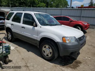 2003 Ford Escape XLS Popular with VIN 1FMYU92163KC43110, listed as a Copart auction lot 58699684 with 66,450 mi miles and Salvage Title. Bid and sale history available at carsss.com. Image 4.