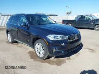 2016 BMW X5 sDrive35i with VIN 5UXKR2C55G0R71330, listed as a IAAI auction lot 41661140 with 128,457 mi miles. Bid and sale history available at carsss.com. Image 1.