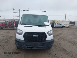 2021 Ford Transit Cargo with VIN 1FTBR1C88MKA52816, listed as a IAAI auction lot 41620731 with 60,716 mi miles and . Bid and sale history available at DreamBid. Image 12.