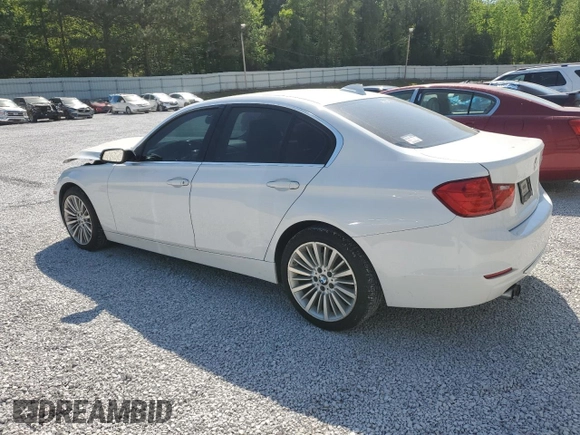 2012 BMW 3 Series 328i with VIN WBA3A5C57CF257346, listed as a Copart auction lot 53744705 with 118,242 mi miles and Salvage title. Bid and sale history available at DreamBid. Image 2.