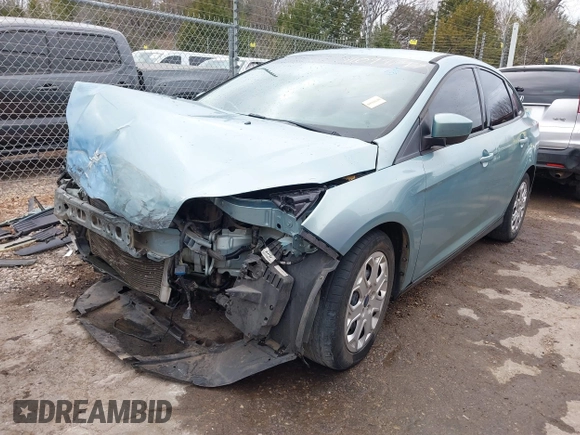 2012 Ford Focus SE with VIN 1FAHP3F2XCL470215, listed as a IAAI auction lot 41094147 with 139,653 mi miles and . Bid and sale history available at DreamBid. Image 2.