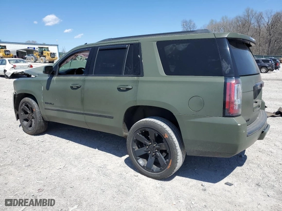 2015 GMC Yukon Denali with VIN 1GKS2CKJXFR553886, listed as a Copart auction lot 50463745 with 134,838 mi miles and Salvage Title. Bid and sale history available at carsss.com. Image 2.