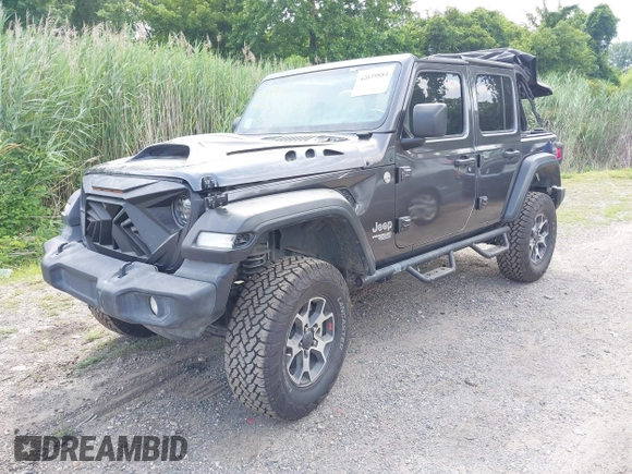 2020 Jeep Wrangler Unlimited Sport S with VIN 1C4HJXDN7LW113735, listed as a IAAI auction lot 42639884 with 48,736 mi miles and . Bid and sale history available at DreamBid. Image 2.
