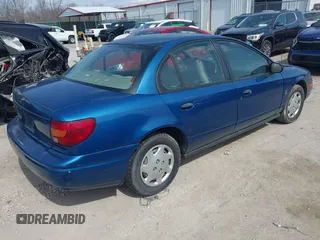 2002 Saturn SL z VIN 1G8ZG52822Z132267, wystawiony jako IAAI lot #41906634 z przebiegiem 144 001 mil mil oraz . Historia ofert i sprzedaży dostępna na DreamBid. Obrazek 4.