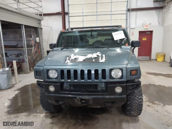 2005 Hummer H2 SUV with VIN 5GRGN23U65H132505, listed as a IAAI auction lot 41515346 with 140,944 mi miles. Bid and sale history available at carsss.com. Image 12.