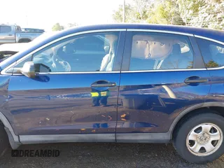 2015 Honda CR-V LX with VIN 3CZRM3H34FG712022, listed as a IAAI auction lot 41007983 with 120,280 mi miles and . Bid and sale history available at carsss.com. Image 14.