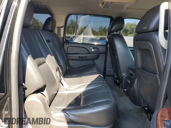 2014 Chevrolet Suburban LT with VIN 1GNSKJE72ER131763, listed as a Copart auction lot 69026754 with 186,248 mi miles and Salvage Title. Bid and sale history available at carsss.com. Image 11.