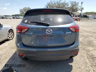 2016 Mazda CX-5 Touring with VIN JM3KE2CY0G0894283, listed as a Copart auction lot 50592065 with 86,400 mi miles and Salvage Title. Bid and sale history available at carsss.com. Image 6.