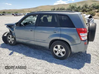 2006 Suzuki Grand Vitara Premium with VIN JS3TD943964102832, listed as a Copart auction lot 59971694 with 148,329 mi miles and Salvage title. Bid and sale history available at DreamBid. Image 2.