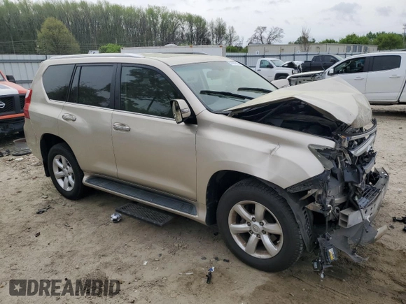 2011 Lexus GX 460 with VIN JTJBM7FX9B5021992, listed as a Copart auction lot 51587885 with 141,677 mi miles and Salvage Title. Bid and sale history available at DreamBid. Image 4.