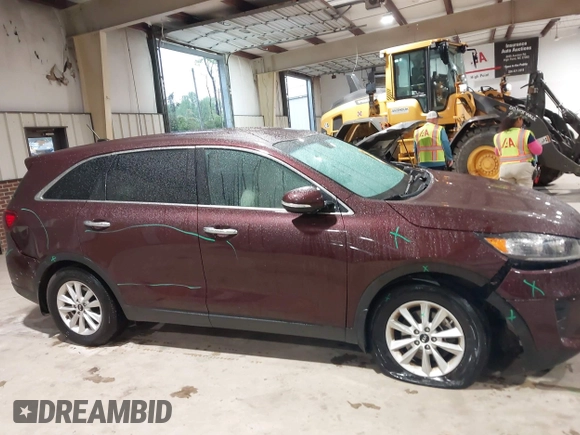 2019 Kia Sorento L with VIN 5XYPG4A34KG548624, listed as a IAAI auction lot 42020831 with 124,226 mi miles. Bid and sale history available at carsss.com. Image 13.
